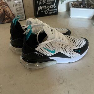 Never worn. Black white and turquoise. Comfortable and clean.